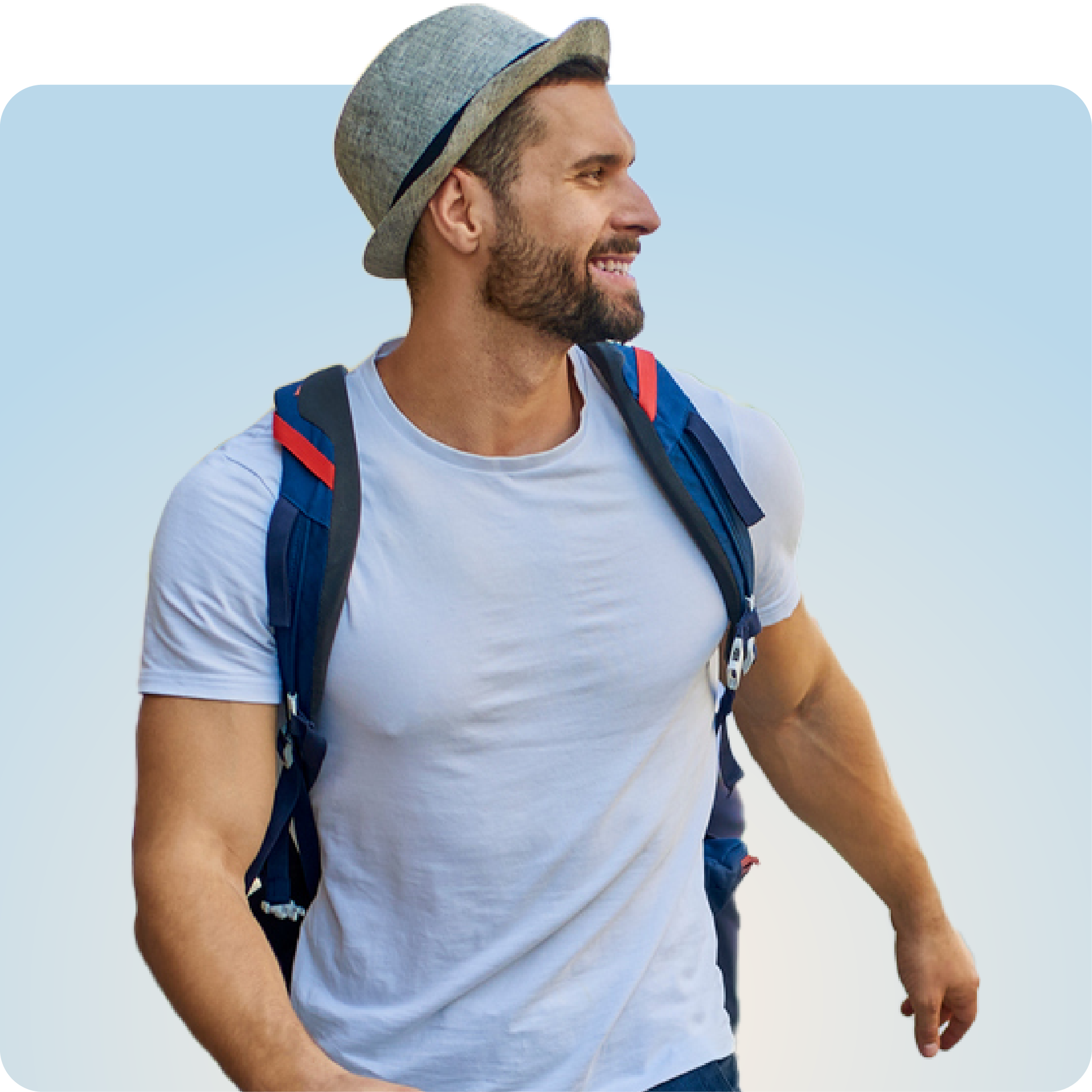 Smiling man wearing a hat and backpack representing freedom with Q Care