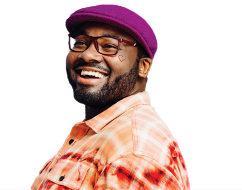 Smiling person in a stylish hat and glasses against a blue background, representing accessible health coverage with Q Care Plus.